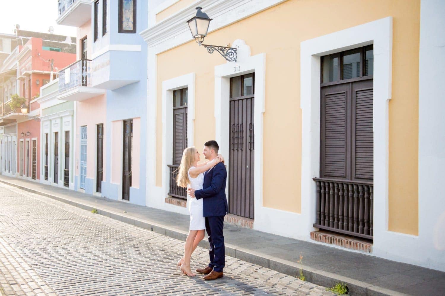 Candid engagement session photography in the colorful streets of Old San Juan Puerto Rico by Camille Fontanez