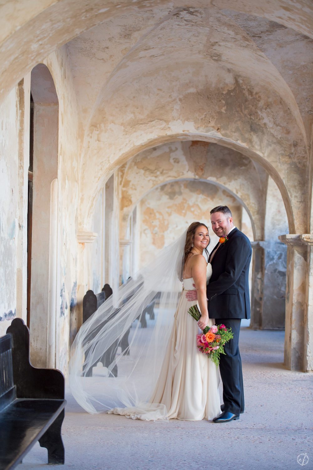 first look and wedding party photo session at Castillo San Cristobal Old San Juan