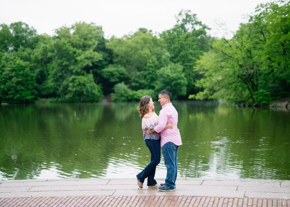 New York City surprise marriage proposal at Bethesda Fountain in Central Park by destination wedding photographer Camille Fontanez