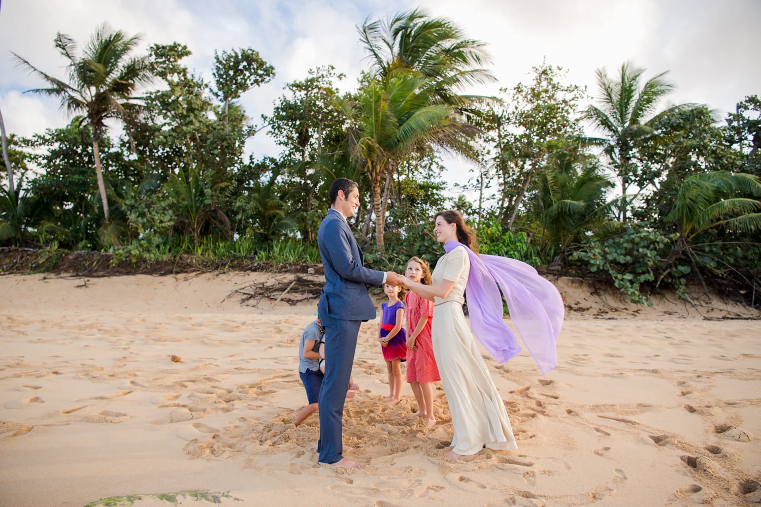 Family portraits and beach couple photos after Birke and James ten year vow renewal in Puerto Rico