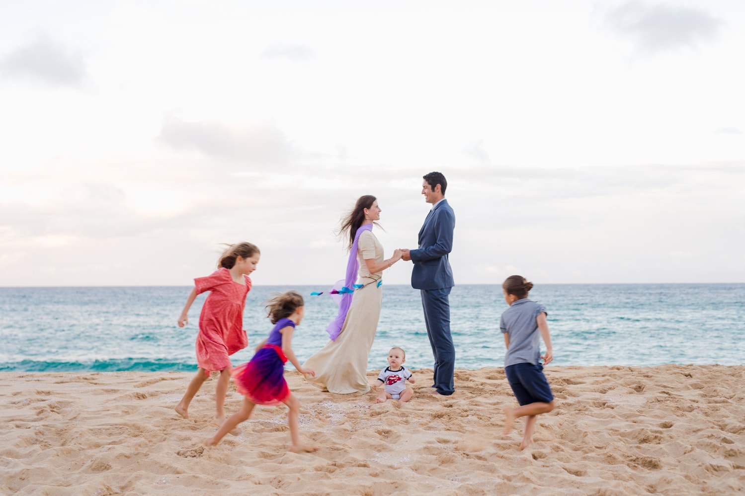 Family portraits and beach couple photos after Birke and James ten year vow renewal in Puerto Rico