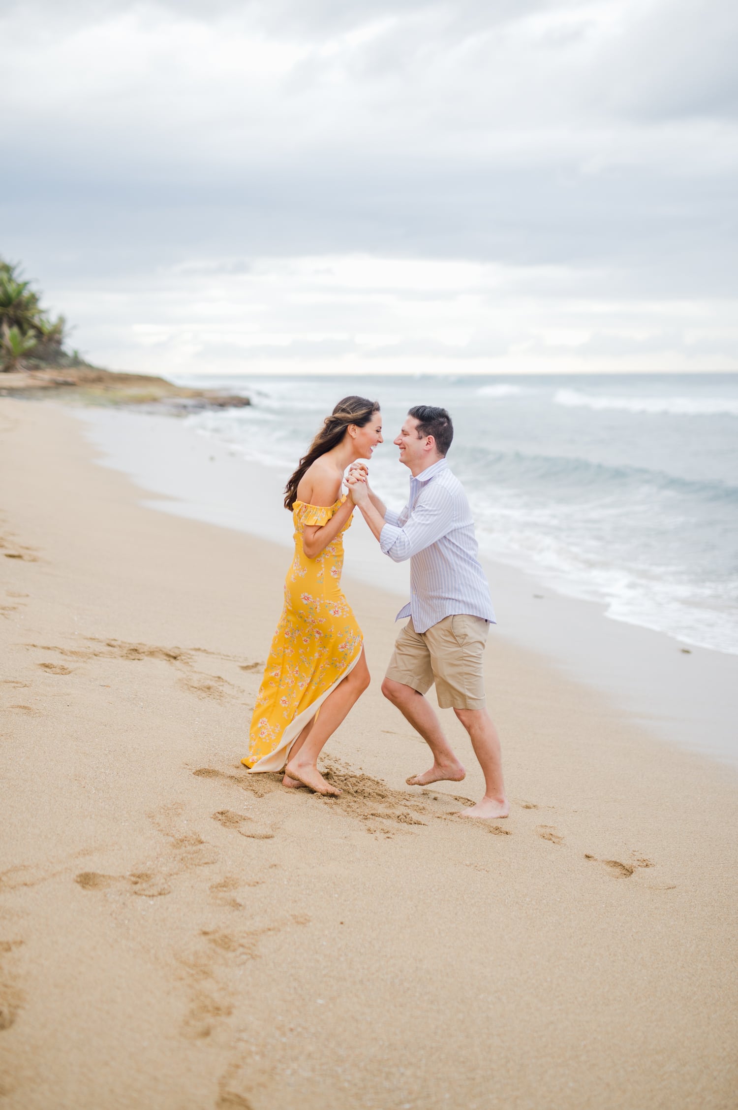 wedding photographer Camille Fontz captures a beach engagement portrait session in Aguadilla, Puerto Rico