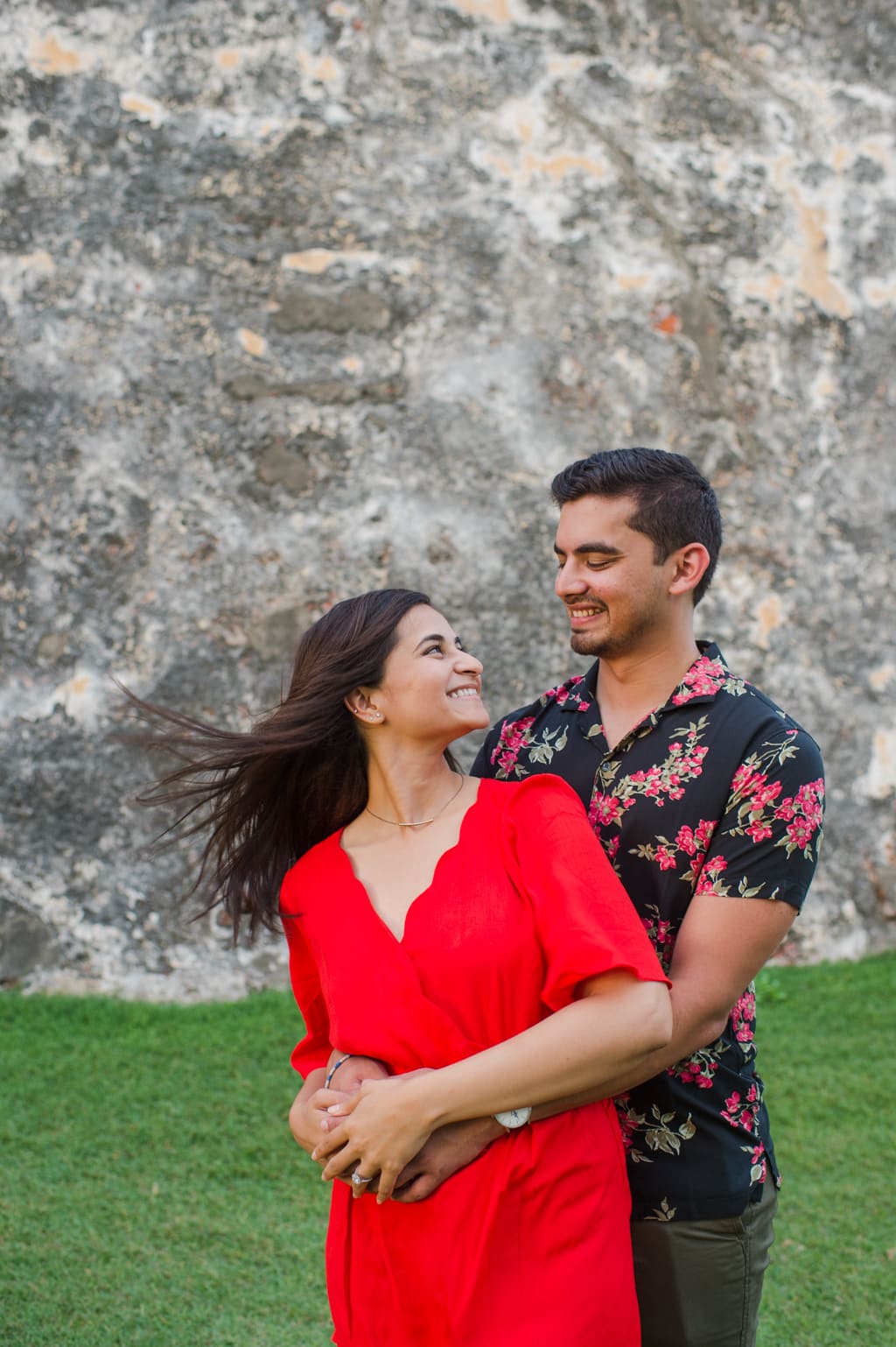 wedding photographer Camille Fontanez captures a marriage proposal at El Morro in Old San Juan, Puerto Rico