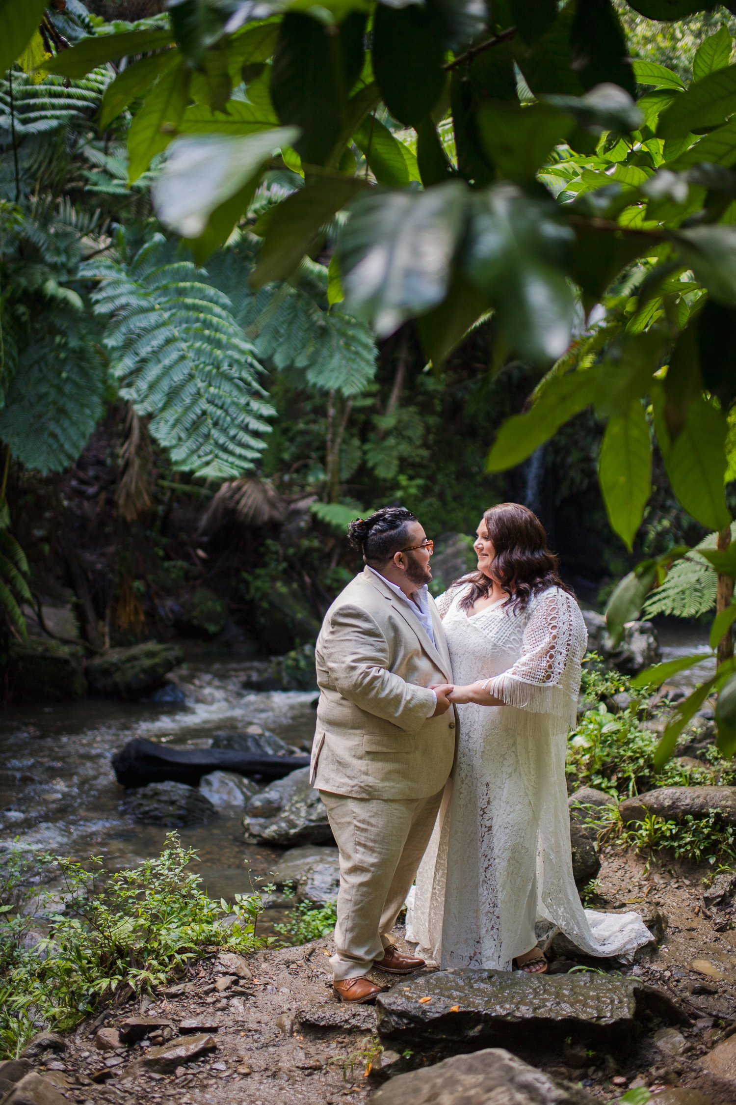 Join Stormee and Asher's romantic El Yunque Rainforest elopement in Puerto Rico. See how they exchanged vows before capturing stunning photos at Hyatt Regency.