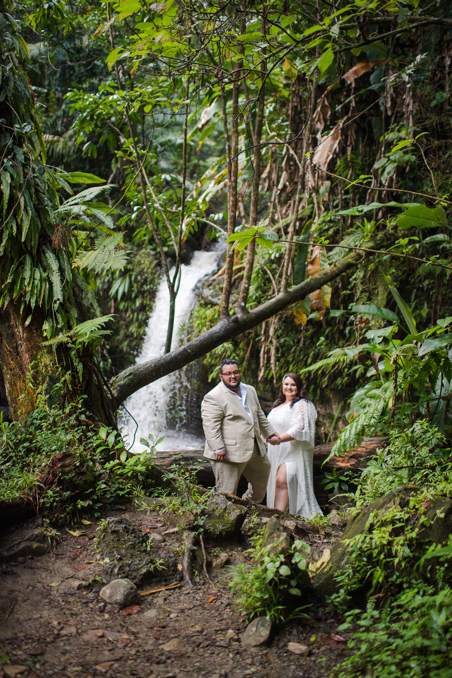 Join Stormee and Asher's romantic El Yunque Rainforest elopement in Puerto Rico. See how they exchanged vows before capturing stunning photos at Hyatt Regency.