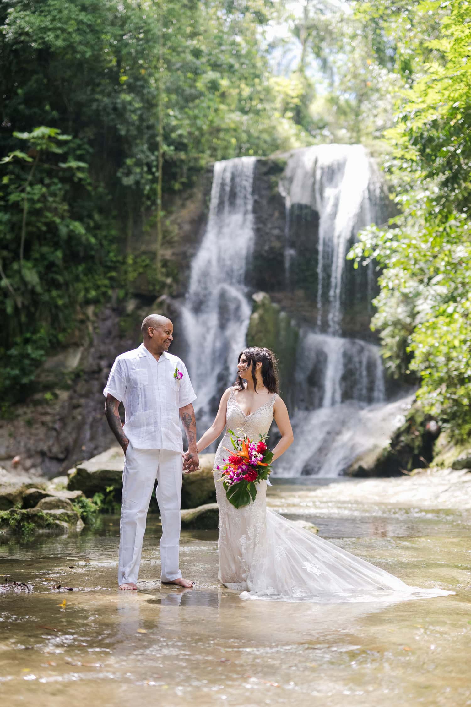 intimate elopement wedding photos at Cascada Gozalandia Falls in San Sebastian Puerto Rico