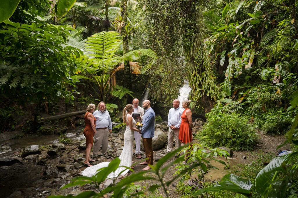 Intimate rainforest wedding ceremony at Juan Diego Falls, El Yunque National Forest Puerto Rico