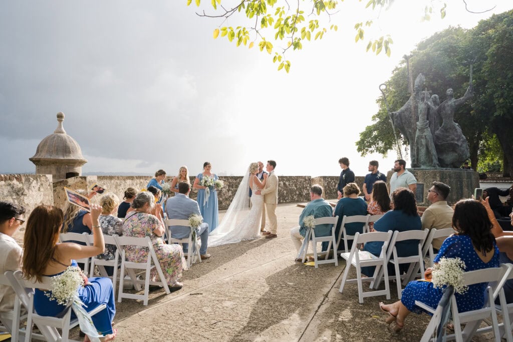 Intimate wedding ceremony at Plazuela La Rogativa, San Juan destination wedding.