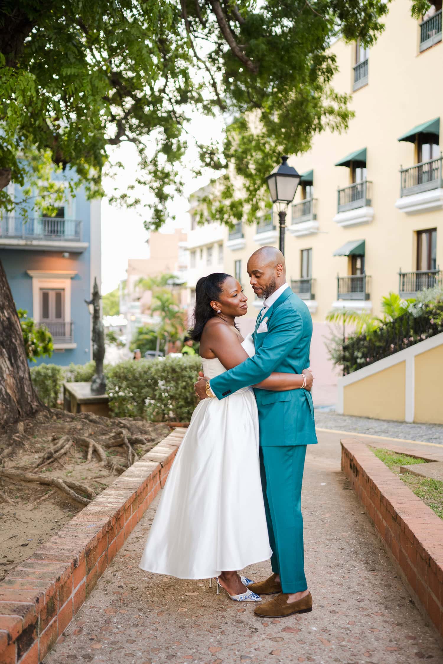 Newlywed photos outdoor setting during their intimate destination wedding in Old San Juan.