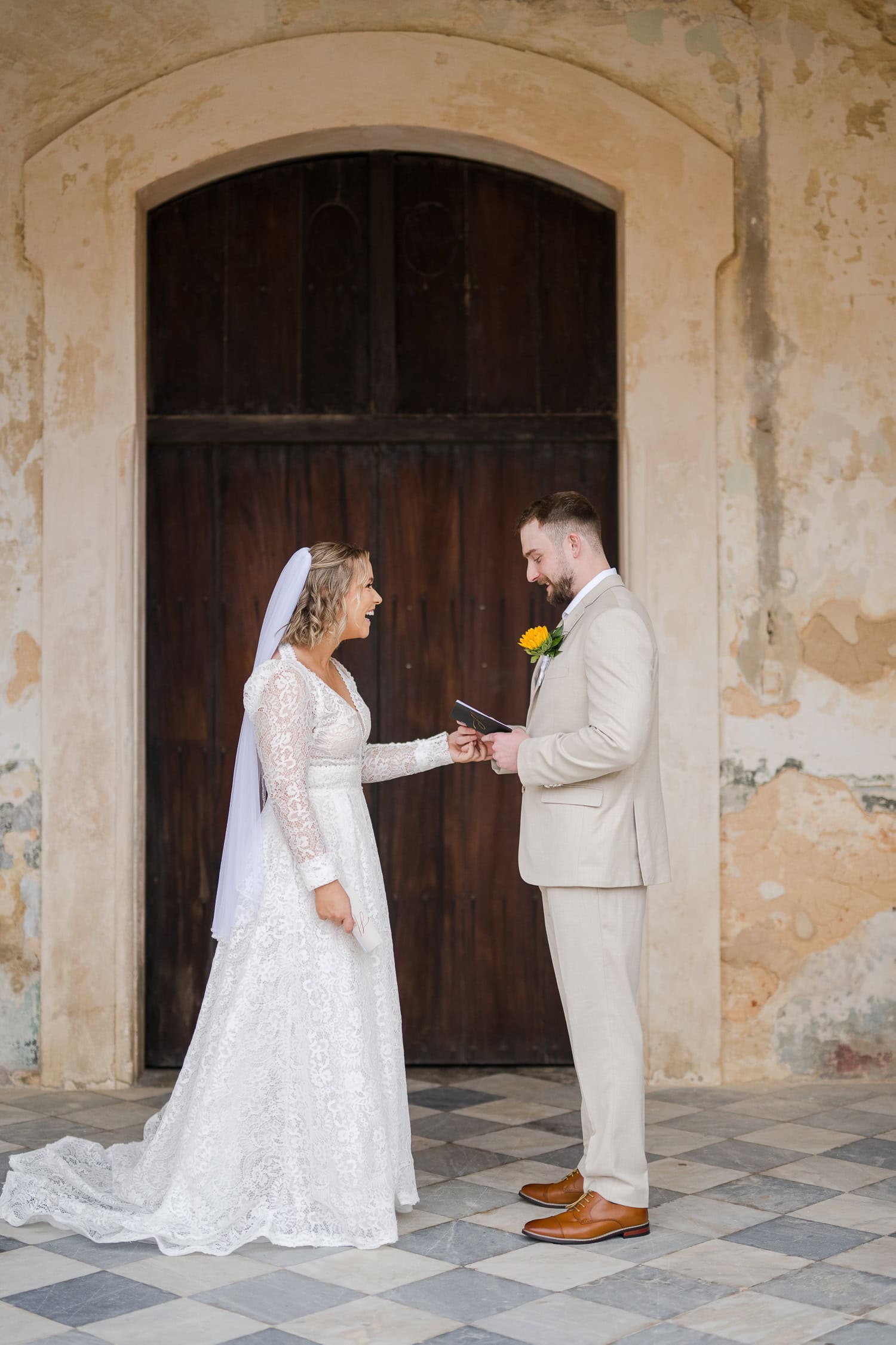 private vows before intimate wedding ceremony at castillo san cristobal puerto rico