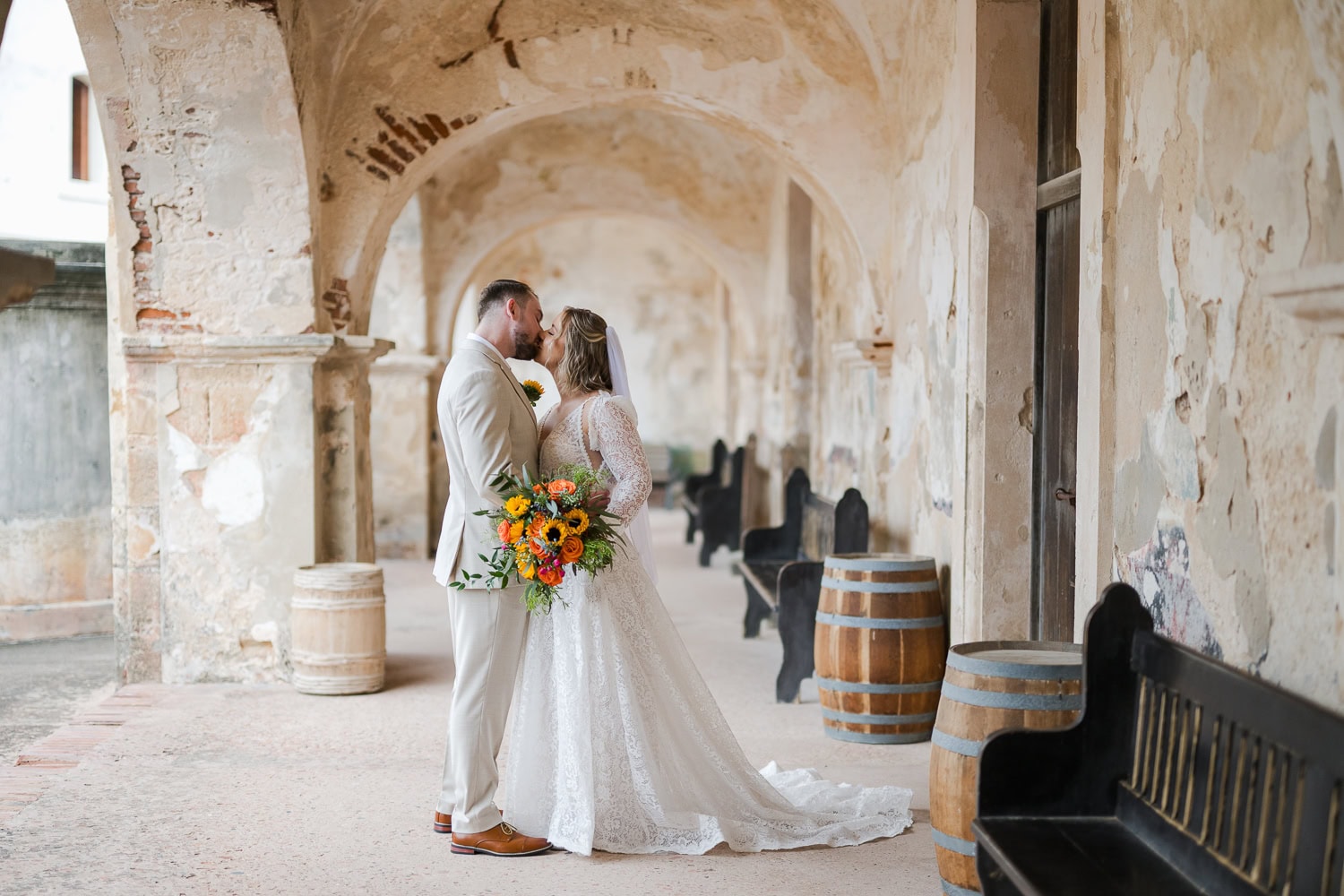 newlywed photography shots of the couple in Castillo San Cristobal Puerto Rico