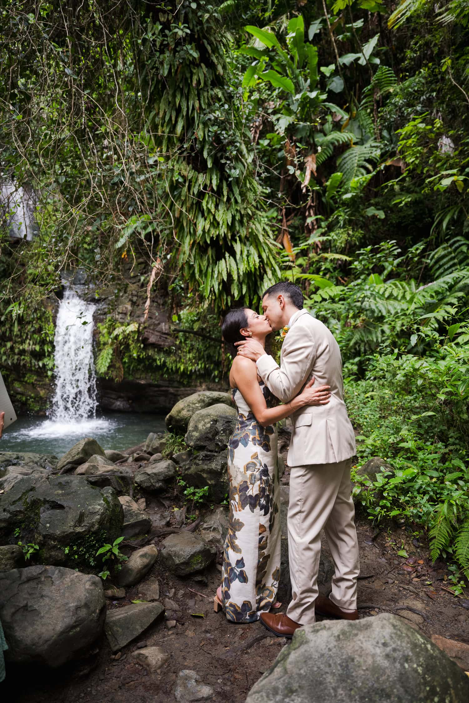 Couple exchanging vows at Juan Diego Falls, El Yunque National Forest