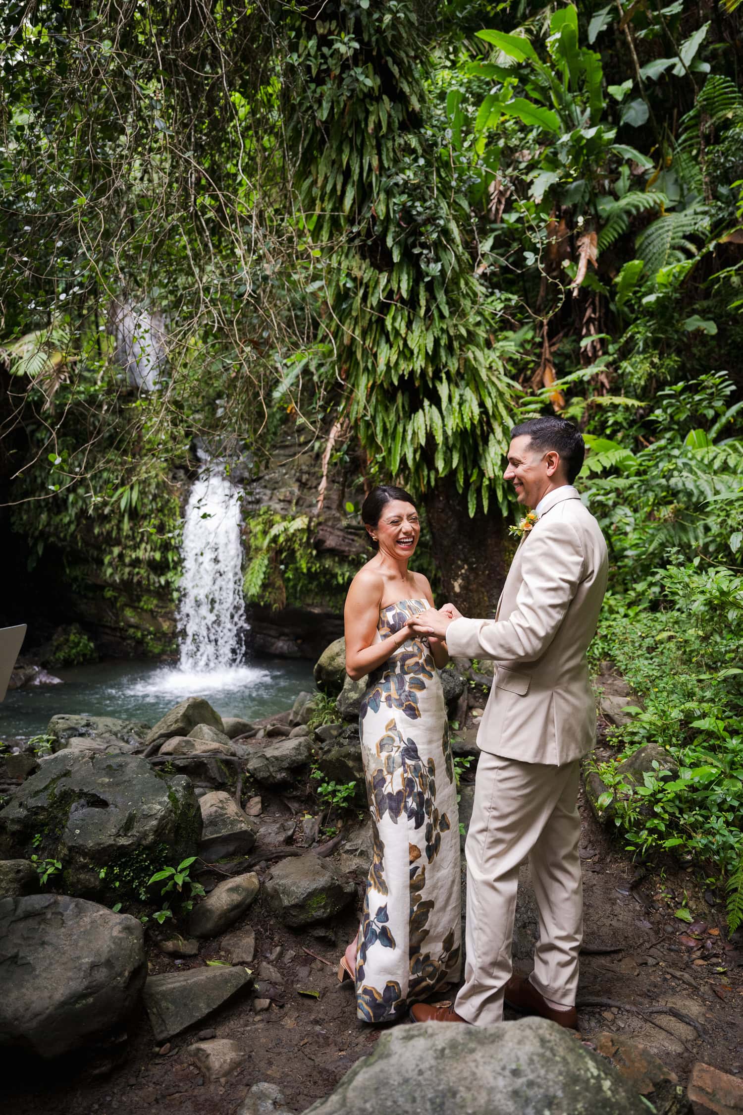 Couple exchanging vows at Juan Diego Falls, El Yunque National Forest