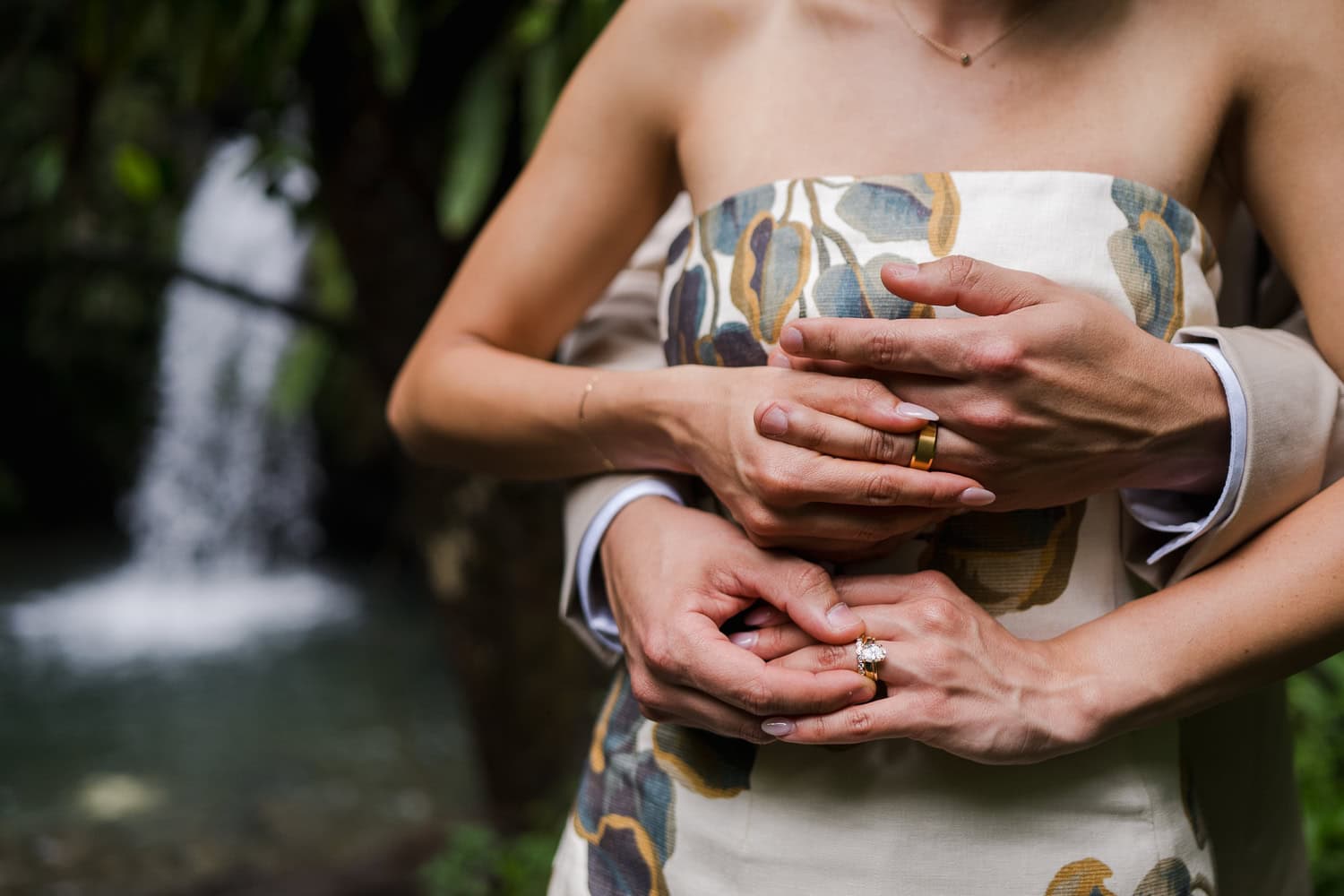 Couple exchanging vows at Juan Diego Falls, El Yunque National Forest