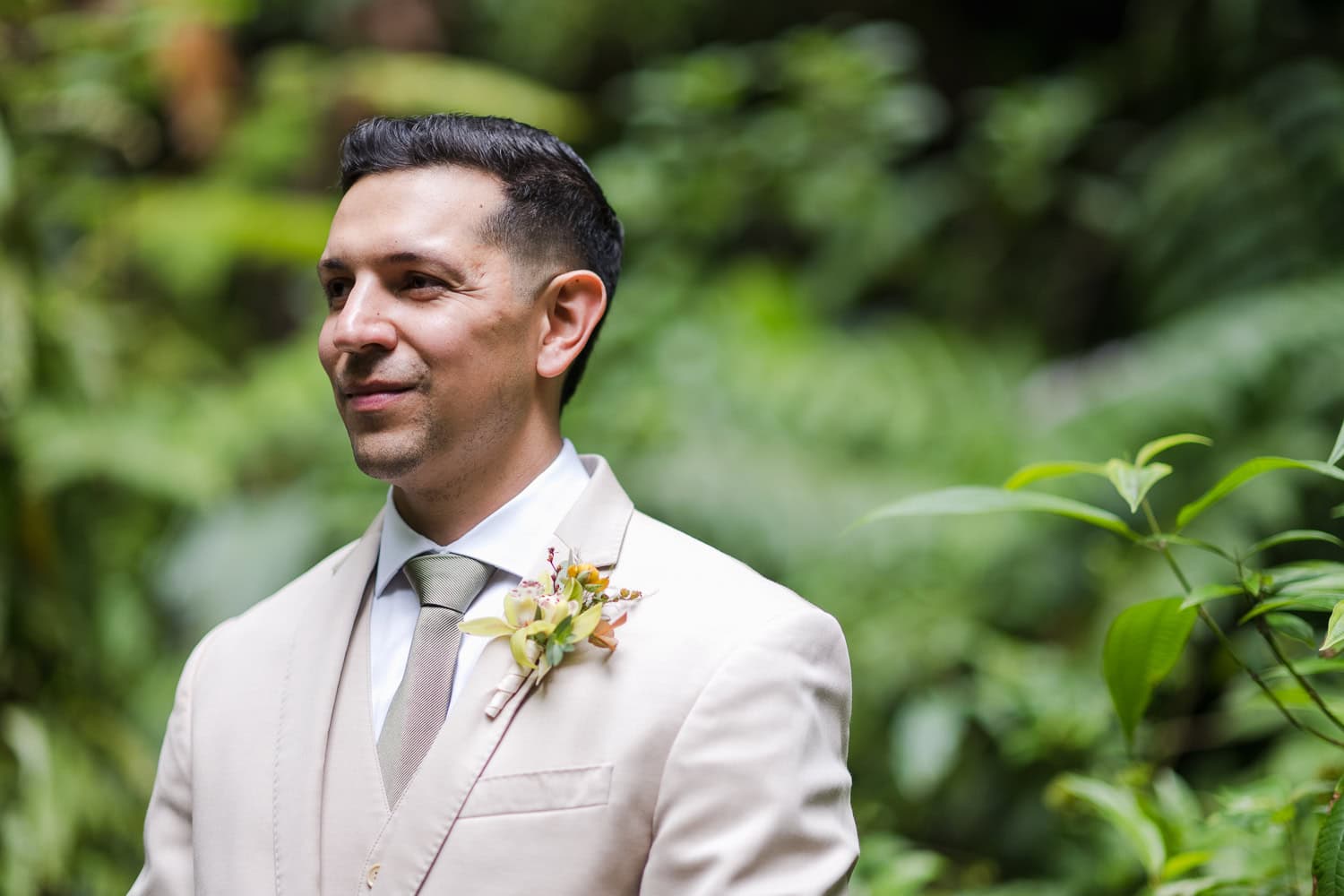 Couple exchanging vows at Juan Diego Falls, El Yunque National Forest