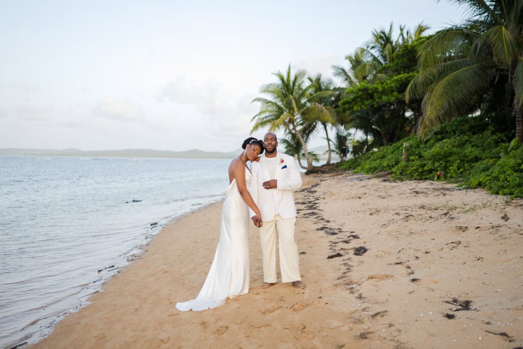 Intimate beach vow renewal ceremony of Joy and Fabian at Punta Bandera Beach, Luquillo, Puerto Rico.