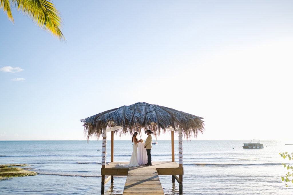 copamarina beach resort wedding ceremony at an overwater bungalow in the caribbean