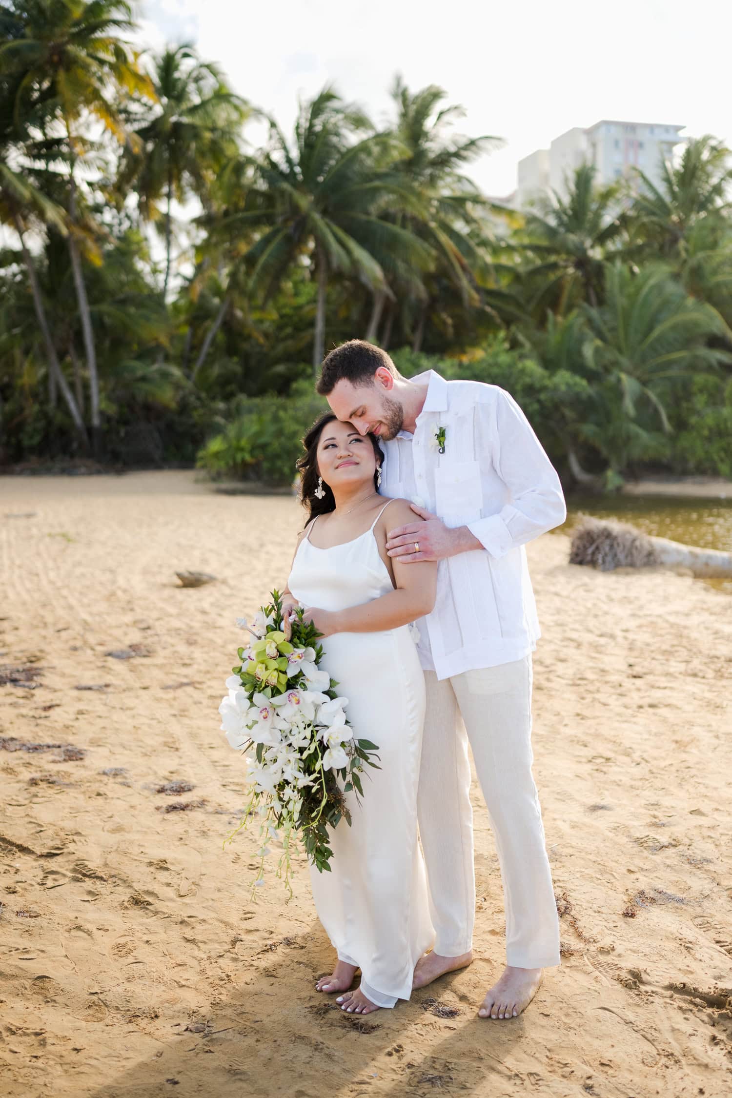 Small intimate beach wedding photography at La Pared Beach, in Luquillo Puerto Rico