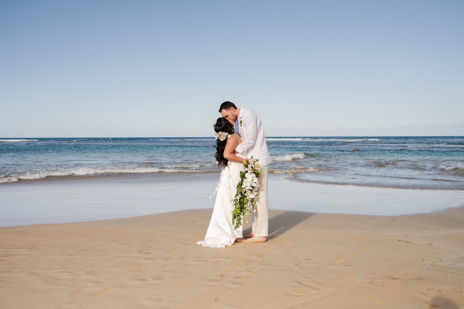 Intimate beach wedding in Puerto Rico at La Pared Beach, Luquillo.