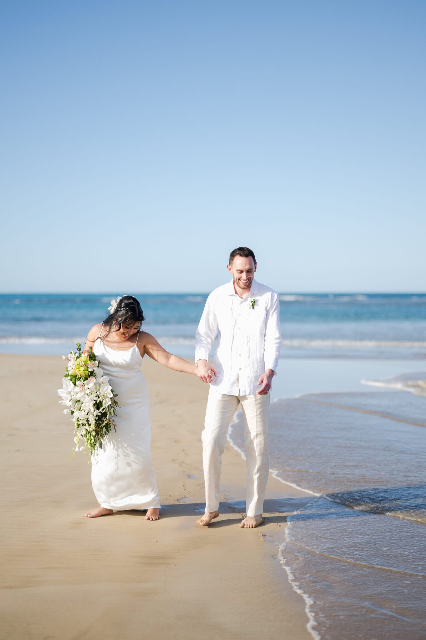 Small intimate beach wedding photography at La Pared Beach, in Luquillo Puerto Rico