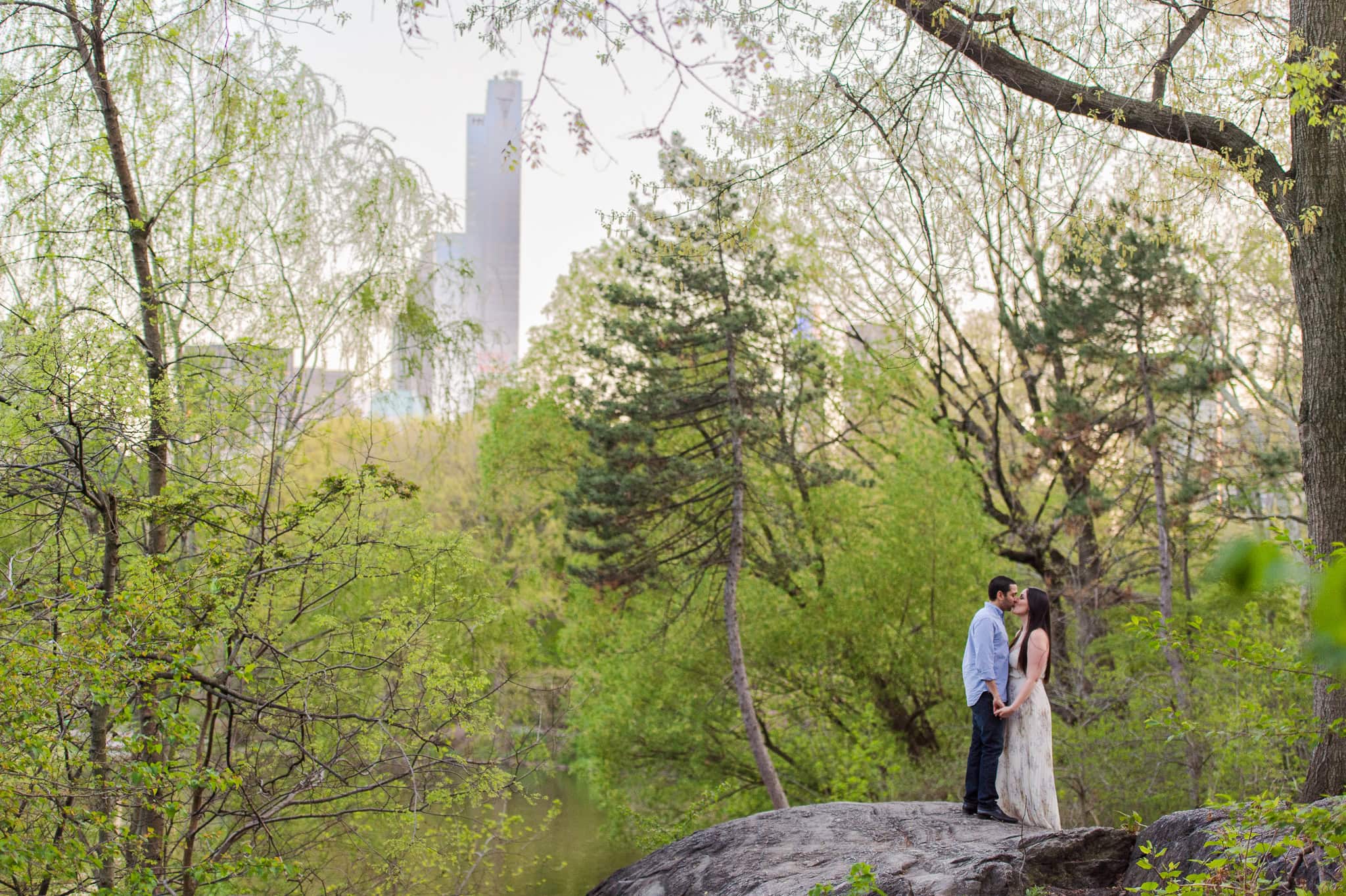 Cherry Blossom Springtime Central Park Engagement Photos wedding photographer camille fontz captures cherry blossom engagement photos in central park, new york city