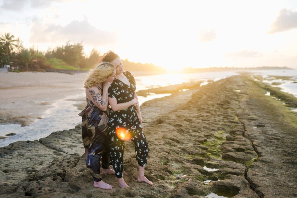 A romantic double proposal at Aviones Beach, Puerto Rico. Tamara and Olivia's intimate LGBTQ+ beach engagement celebration captured in golden hour light.