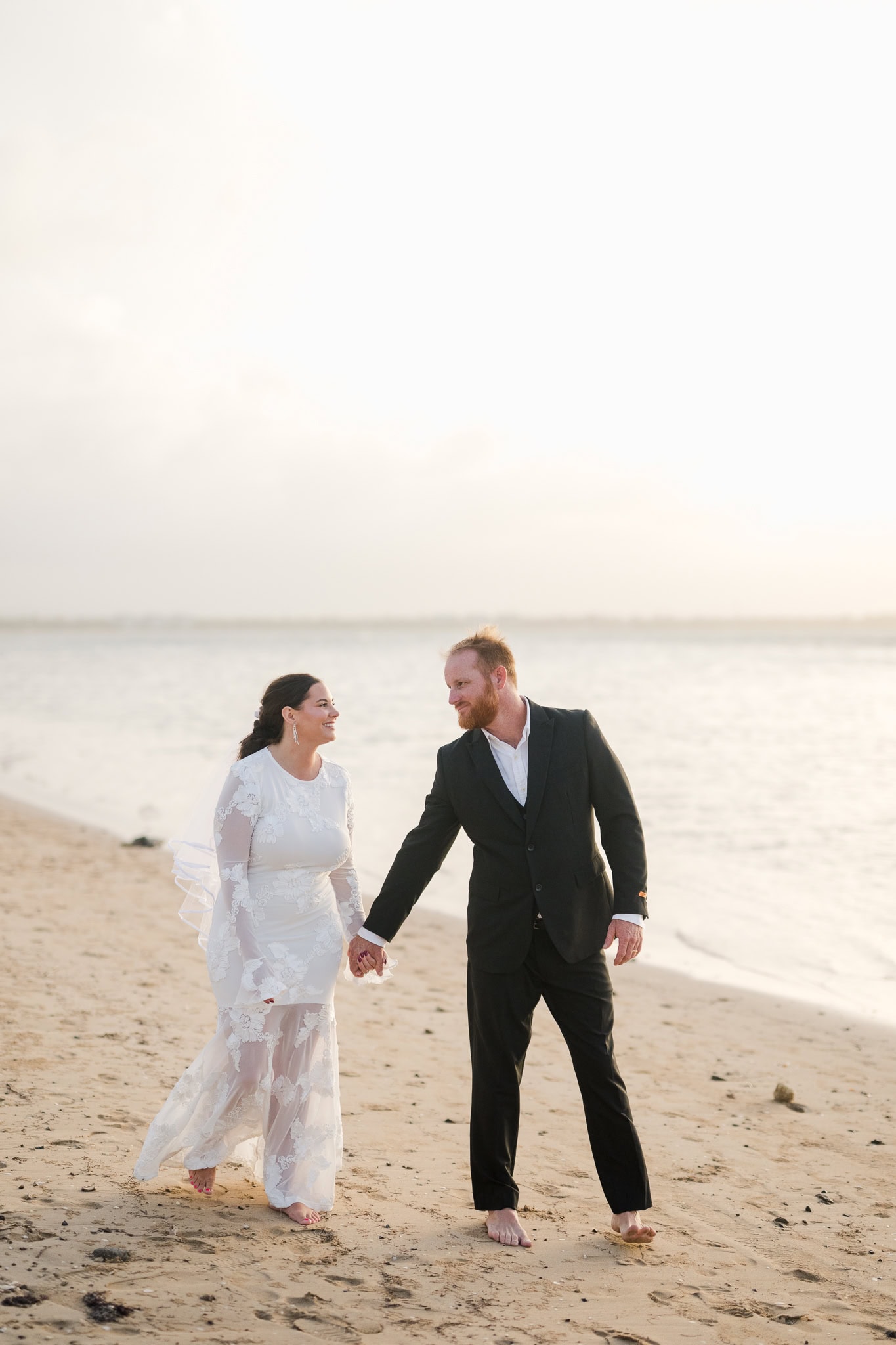 Elopement in Puerto Rico: A Beachside Love Story at Hyatt Grand Reserve After a courthouse wedding back home, Courtney and Jeremy celebrated with an intimate beach photo session in Puerto Rico. See their heartfelt Hyatt Regency elopement portraits.
