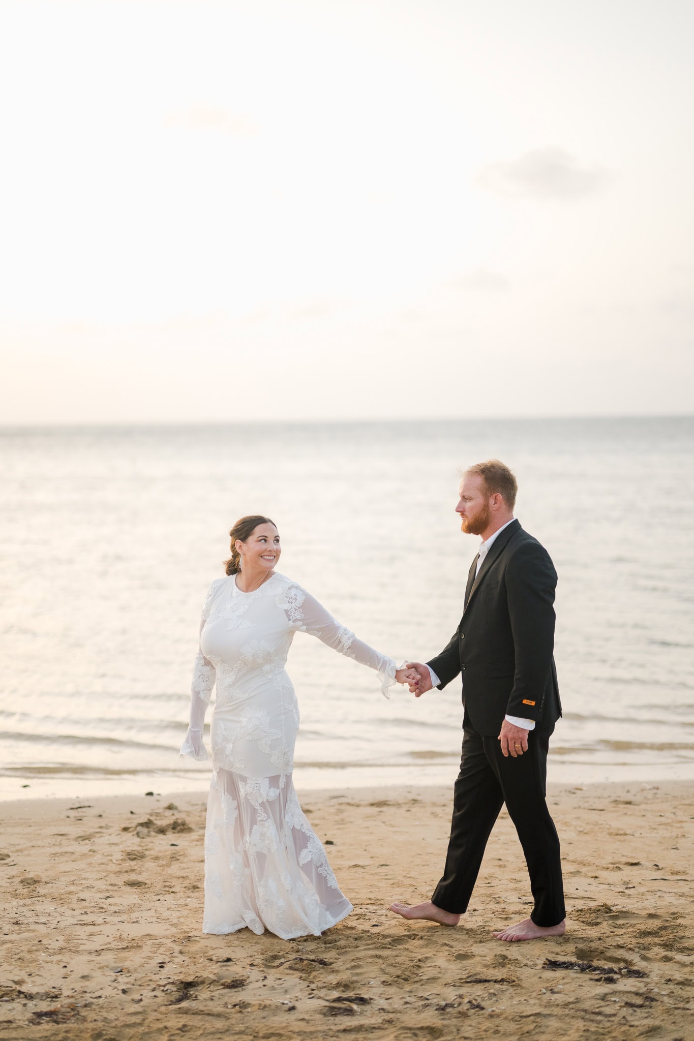 Elopement in Puerto Rico: A Beachside Love Story at Hyatt Grand Reserve After a courthouse wedding back home, Courtney and Jeremy celebrated with an intimate beach photo session in Puerto Rico. See their heartfelt Hyatt Regency elopement portraits.