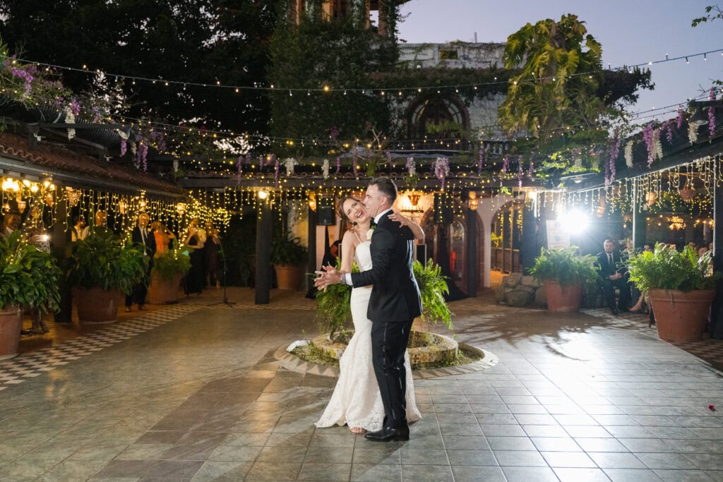 Bride and groom’s first dance at Hacienda Siesta Alegre courtyard
