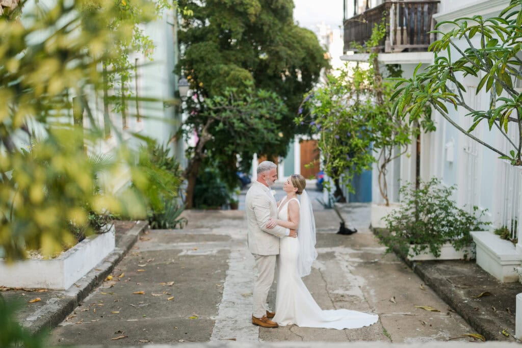 Old San Juan elopement photos on colorful street with pastel buildings