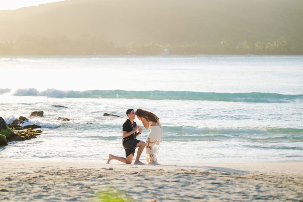 Marriage proposal at sunset on an island beach in the Caribbean
