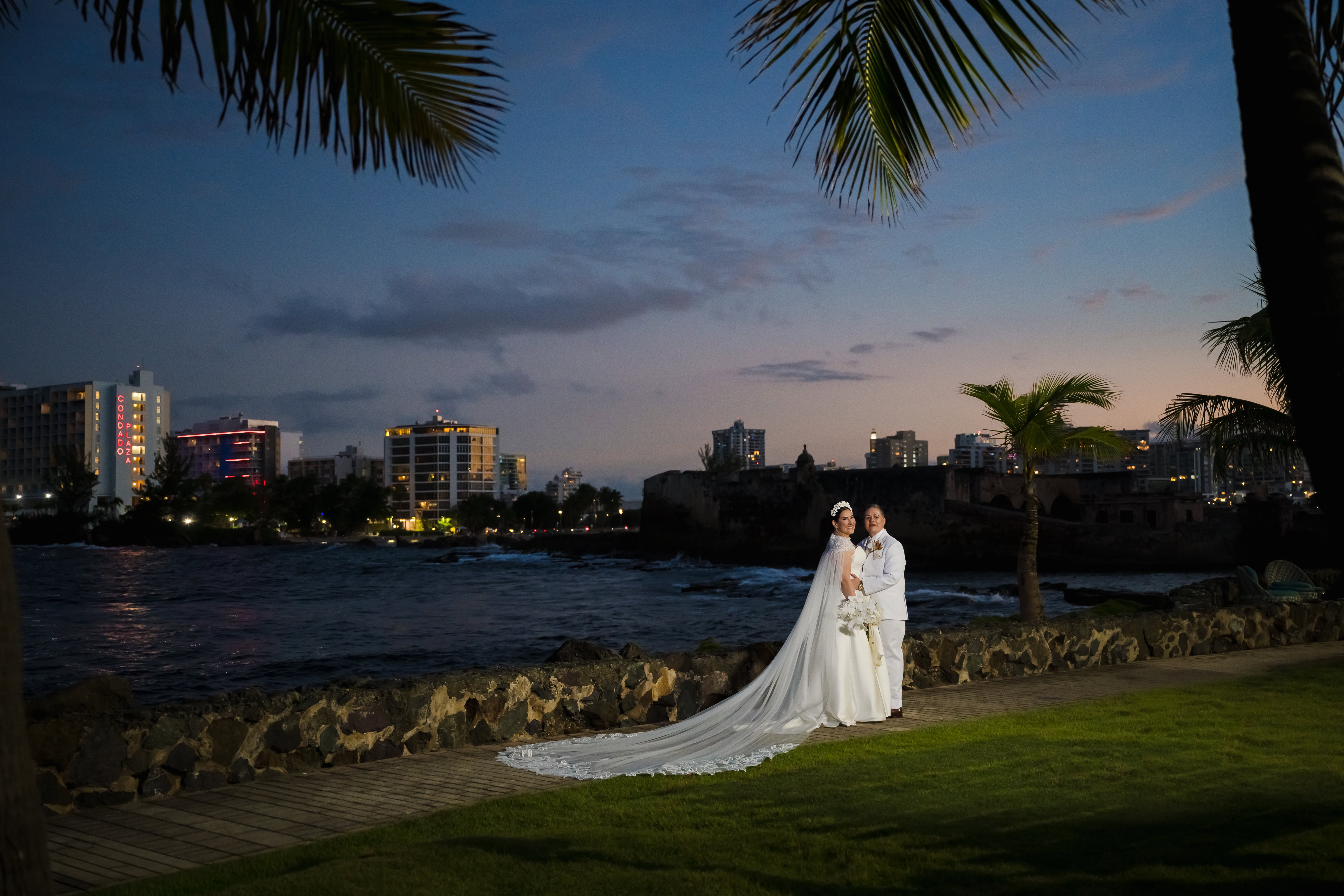 Tropical retro glam lesbian wedding at the Caribe Hilton in San Juan, Puerto Rico — photography by Camille Fontz.