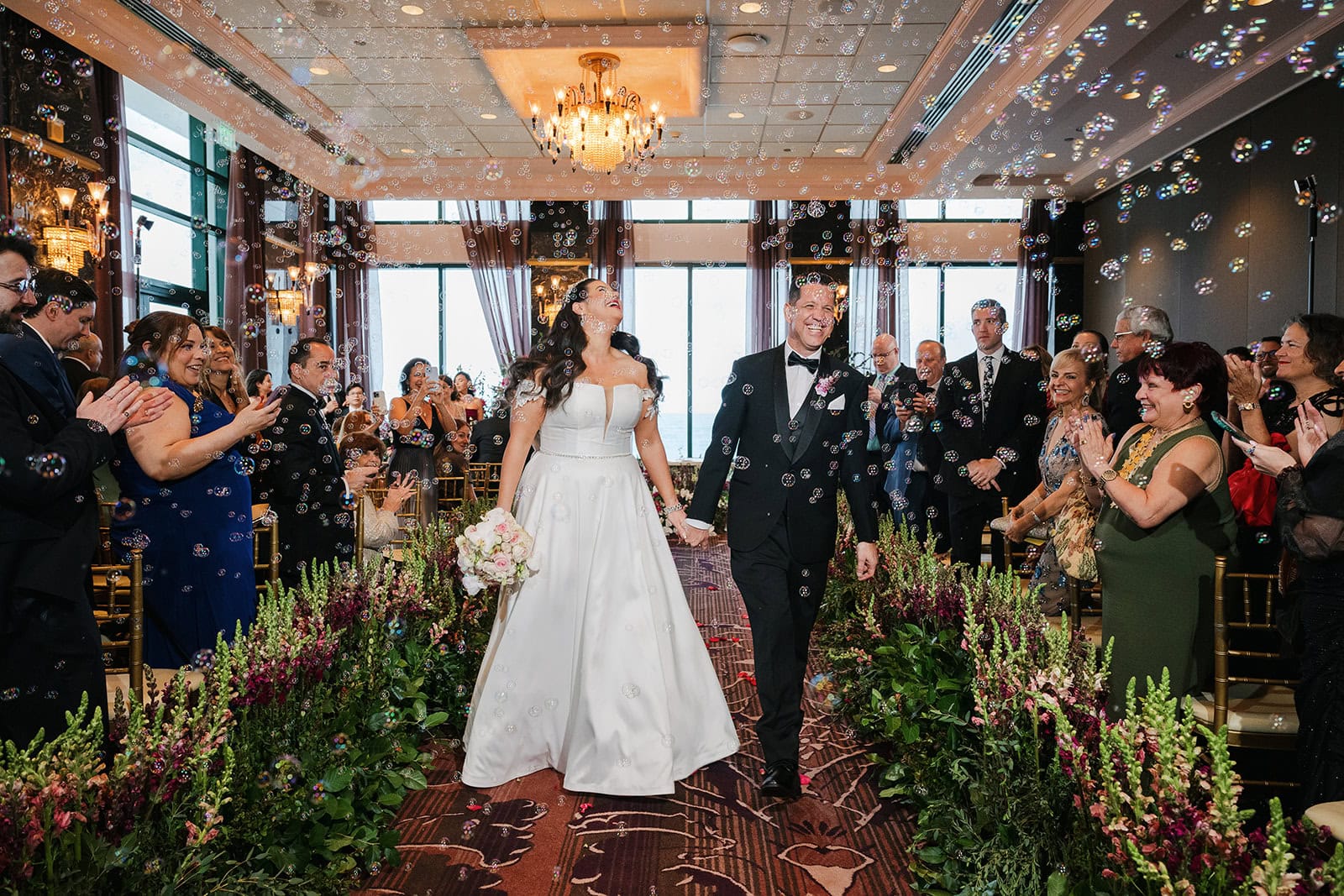 A destination wedding at the Condado Vanderbilt Hotel in San Juan, Puerto Rico — captured by wedding photographer Camille Fontz. Salon Dorado, luxury florals