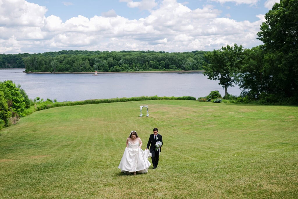 Hudson Valley wedding photographer Camille Fontz captures Aliyah and John's intimate riverside wedding, a full circle story that began with a proposal in Puerto Rico.