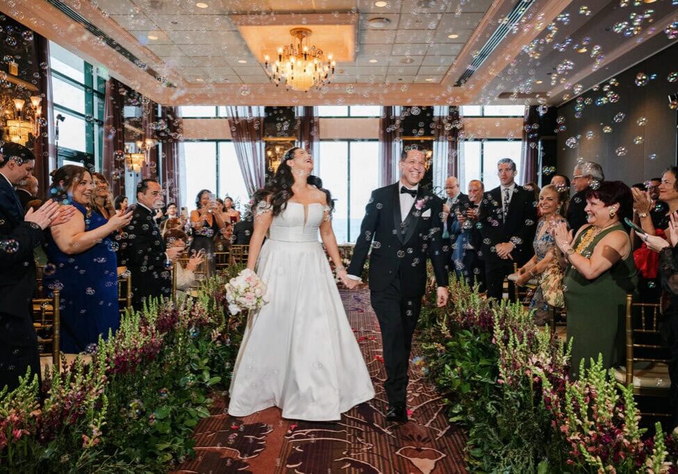 A destination wedding at the Condado Vanderbilt Hotel in San Juan, Puerto Rico — captured by wedding photographer Camille Fontz. Salon Dorado, luxury florals