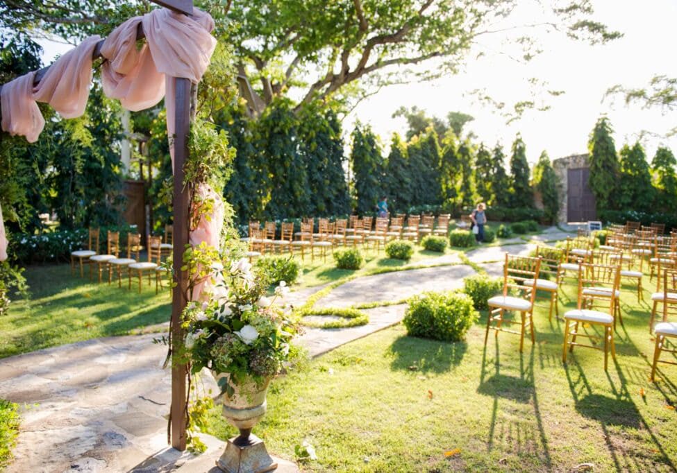 Ceremony venue decor at Hacienda Don Carmelo in Puerto Rico by photographer Camille Fontanez