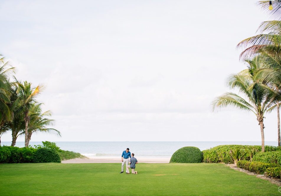 Same-sex marriage proposal engagement session at St Regis Bahia Beach by Camille Fontanez